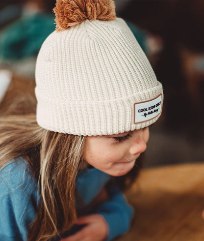 Bonnet Enfants Color Block Sandy, avec pompon, doublure polaire, coton biologique, dès 9 mois, Cool Kids Only !