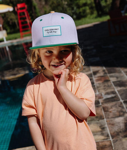 Kinderpet roze Groene klep plat vizier vooraanzicht Hello Hossy
