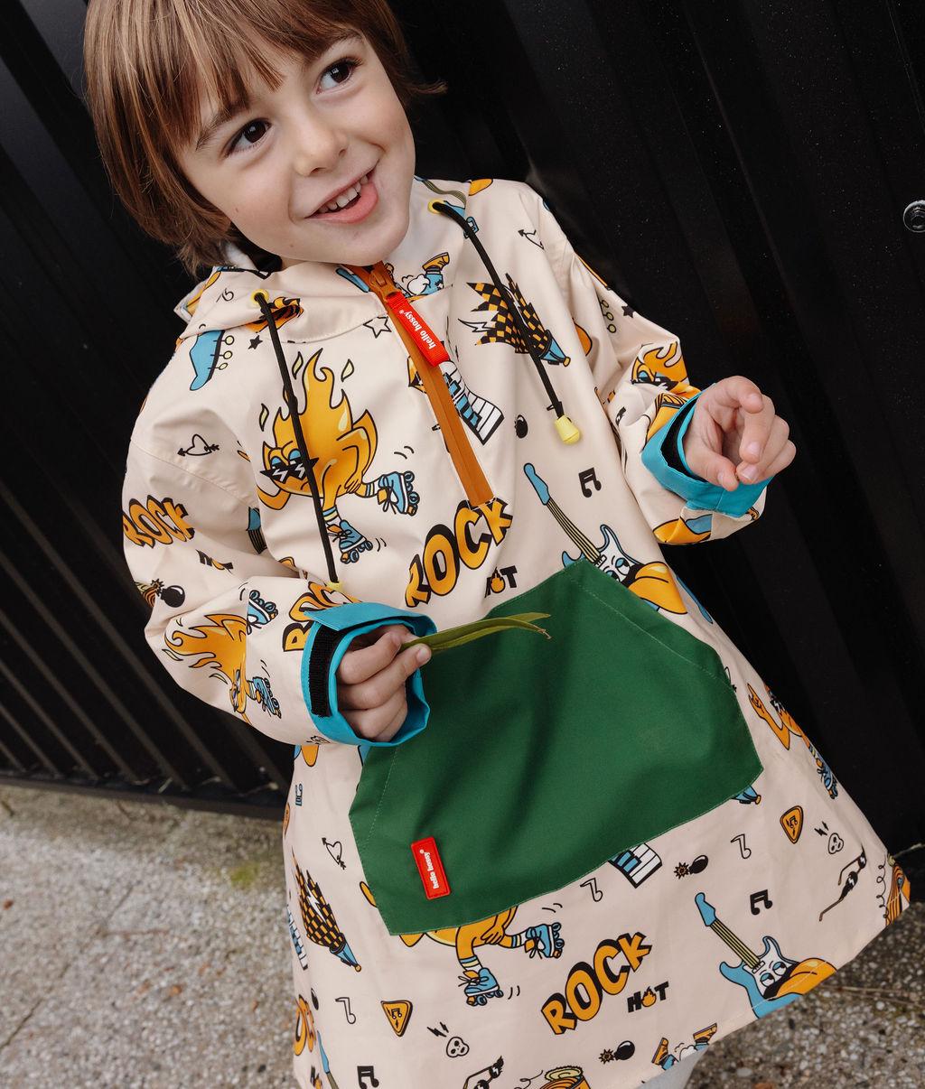 Kinderegenponcho Crème muziek motieven groene zak Hello Hossy