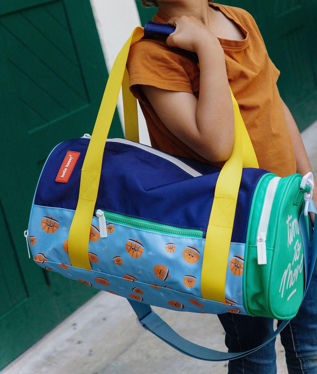 Sporttas kind blauw groen oranje sportmotief geel handvat Hello Hossy